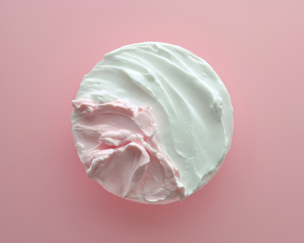 white cosmetic cream and pink body butter